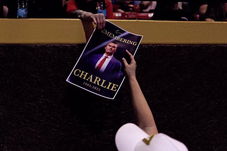 People attend a vigil for Charlie Kirk at Arizona State University on Sept. 15, 2025 in Tempe.