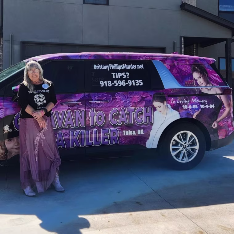 Maggie Zingman standing with her "Caravan to Catch a Killer"