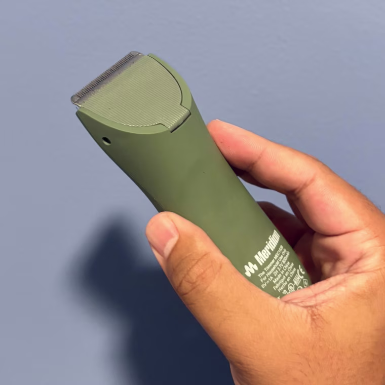 Person holding the sage Meridian The Trimmer Original.