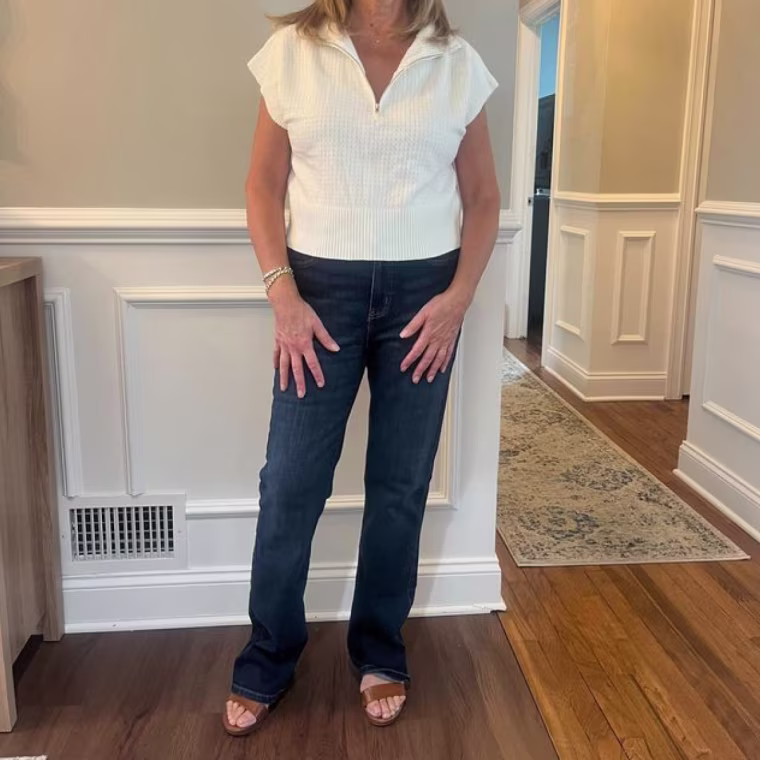 Christina Murphy (mother of commerce writer Danielle Murphy) wearing the Amazon Essentials Mid-Rise Bootcut Jean.
