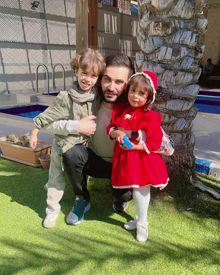 Shadi Abu Sido, 35, and his children.