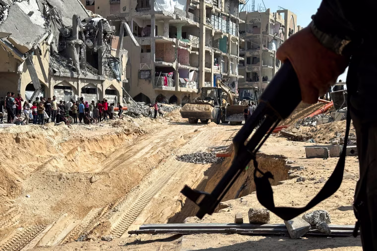 Search for the bodies of hostages killed after being seized by Hamas, in Khan Younis