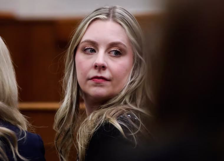 Abby Zwerner looks back while waiting for court to begin.