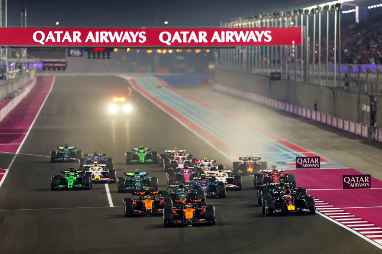 Racecars driving on a race track