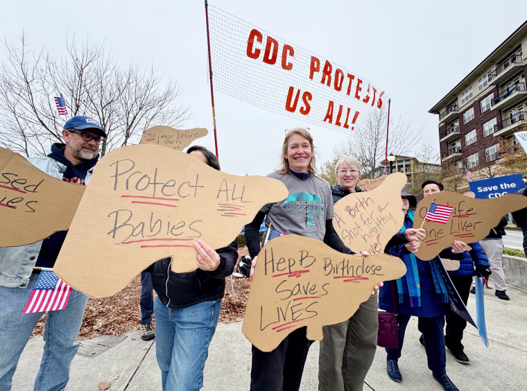 Protesters outside the ACIP meeting at CDC headquarters in Atlanta on Thursday.