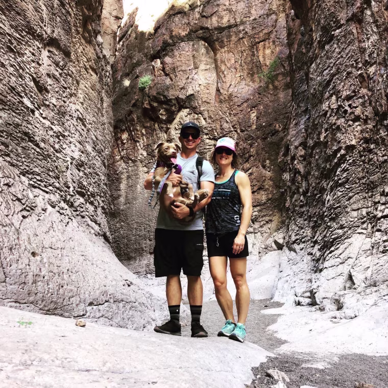 Christina Koch with her husband and dog.