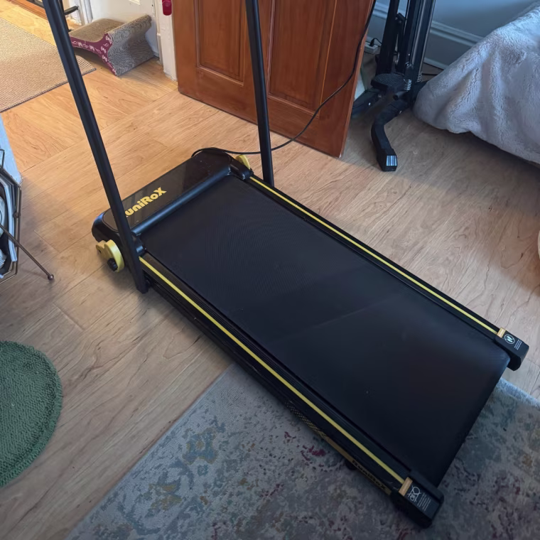 Image of the RuniRox Walking Pad in a living room.