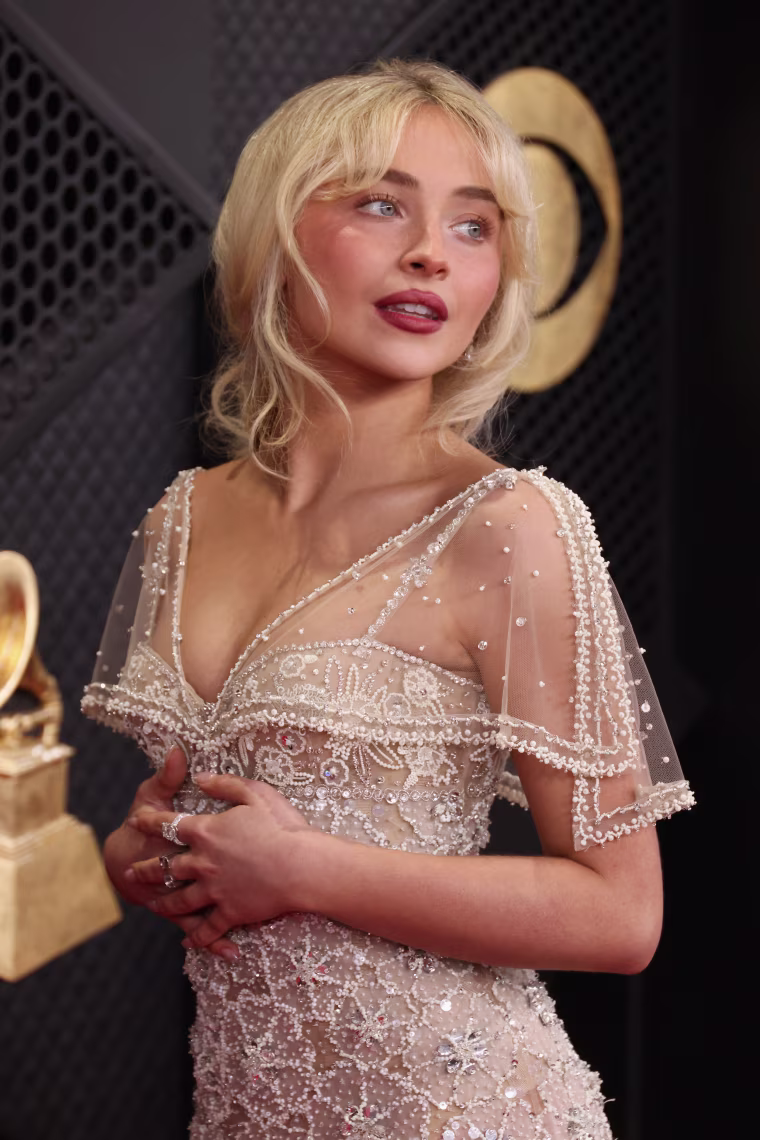 Sabrina Carpenter looks breathtaking in a sheer Valentino dress.