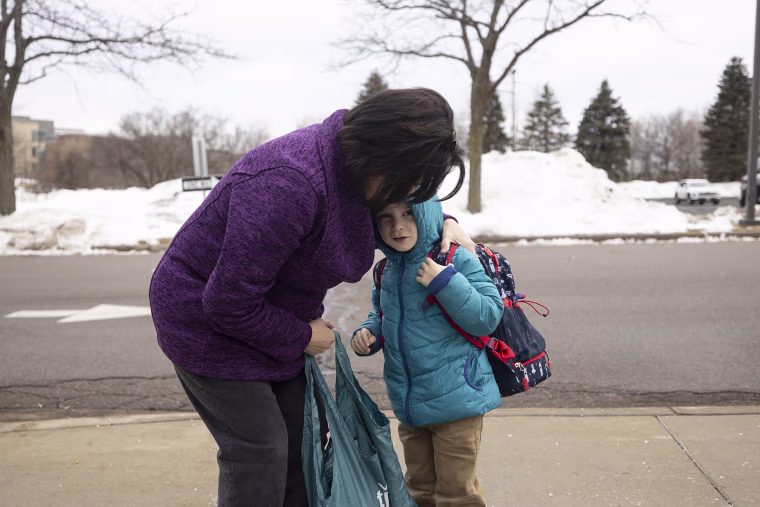 Michelle Eagan drops her son, Everett, 5, off at preschool in Eden Prairie, Minn.