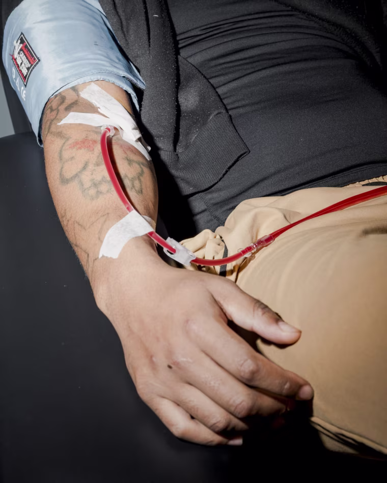 A man donates his plasma at the B Positive plasma center in Holmes, Pa., in January.
