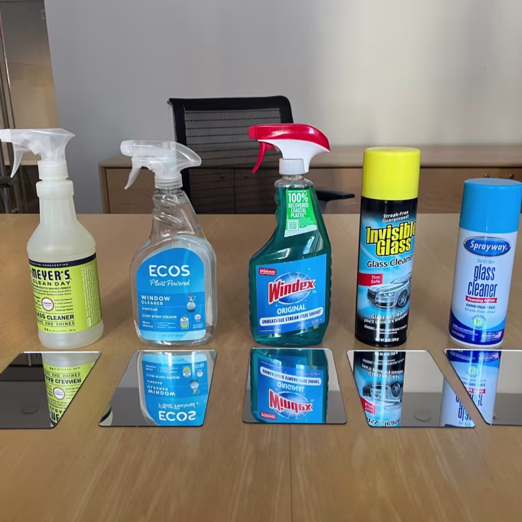 Each mirror after being cleaned with the respective glass cleaners.