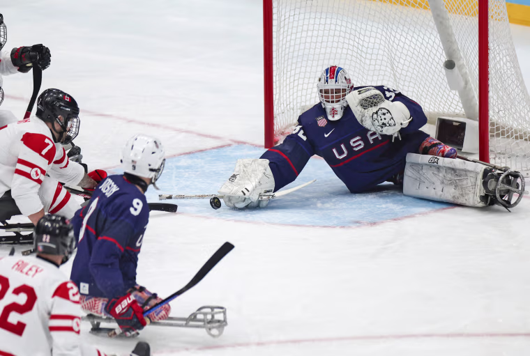 U.S. goalkeeper Jen Lee makes a save during gold medal game against Canada at the Beijing 2022 Paralympic Winter Games.