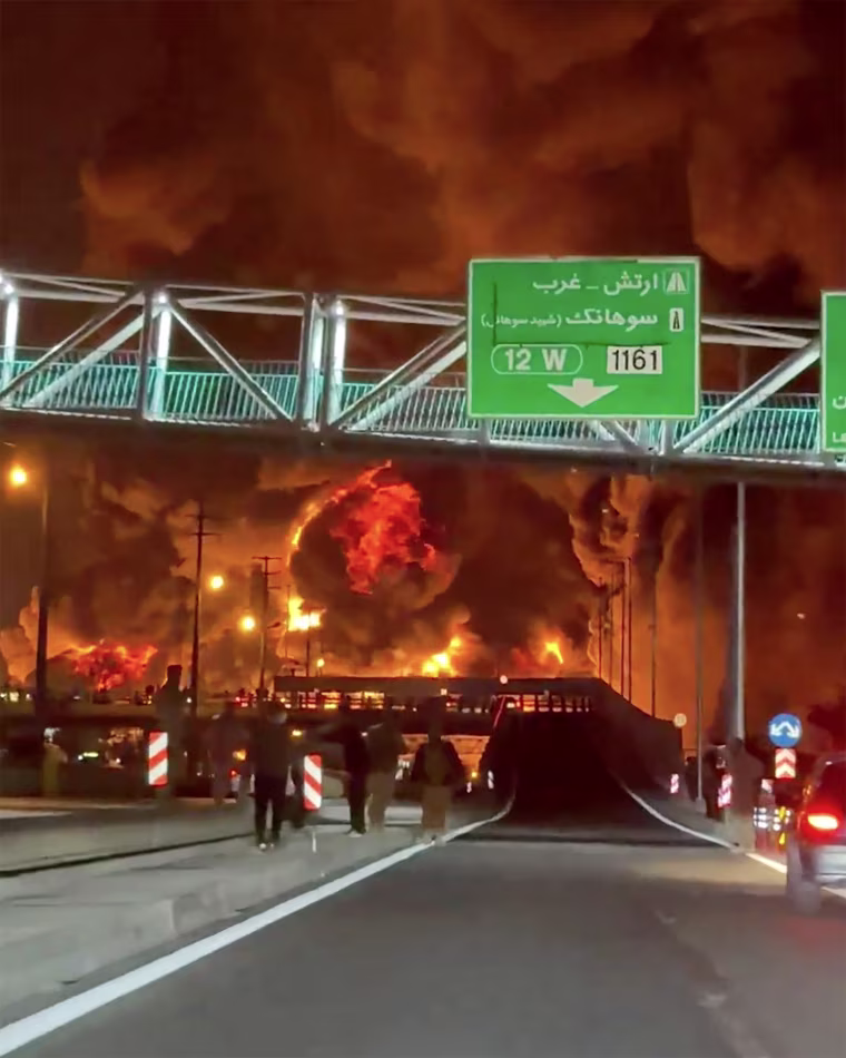 The fiery aftermath of an airstrike on an oil depot in northeast Tehran in a still from a video shared on social media Sunday and verified by NBC News.