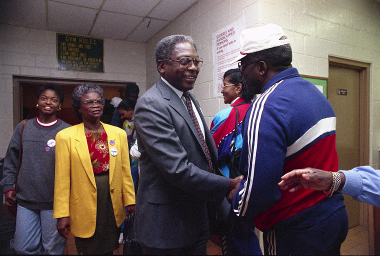 Jim Clyburn, center, greets voters at his precinct in 1992.