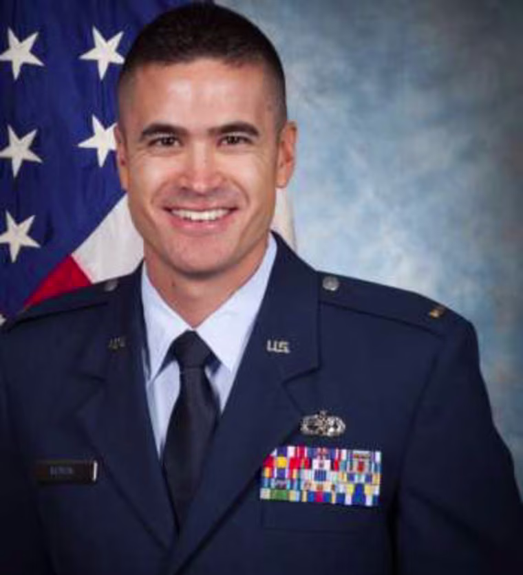 Seth R. Koval smiles in a portrait
