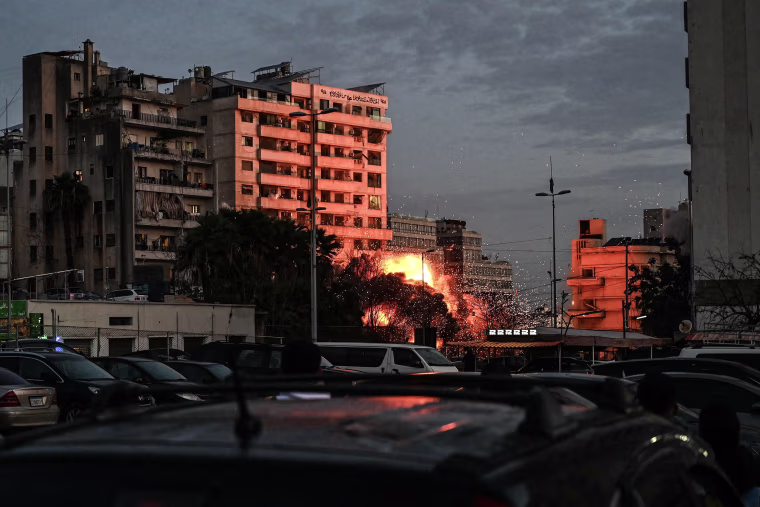 A fireball rises from the site of an Israeli airstrike that targeted a building in Beirut's Bashoura neighbourhood on March 18, 2026.