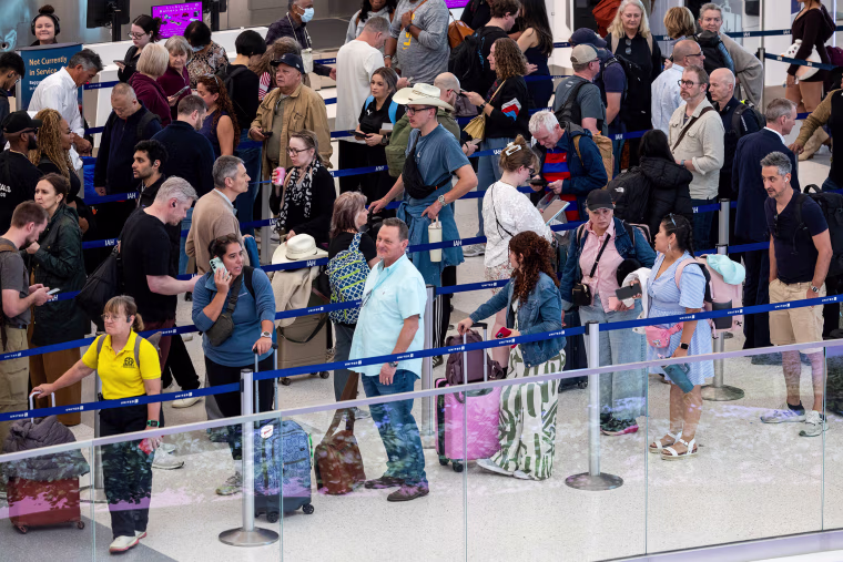 People wait in line.