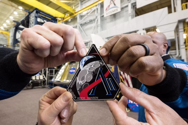 The Artemis astronauts unveil their emblem on April 2, 2025.