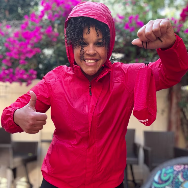 Start TODAY fitness and mindset coach Lacee Green wears the 33,000ft Women's Packable Rain Jacket in size XL.