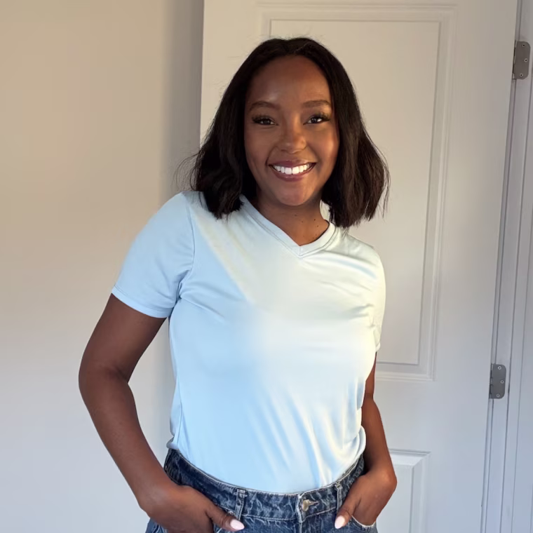 Shop TODAY contributor Makho Ndlovu models the Hanes Women's Sport Cool Dry V-Neck T-Shirt.