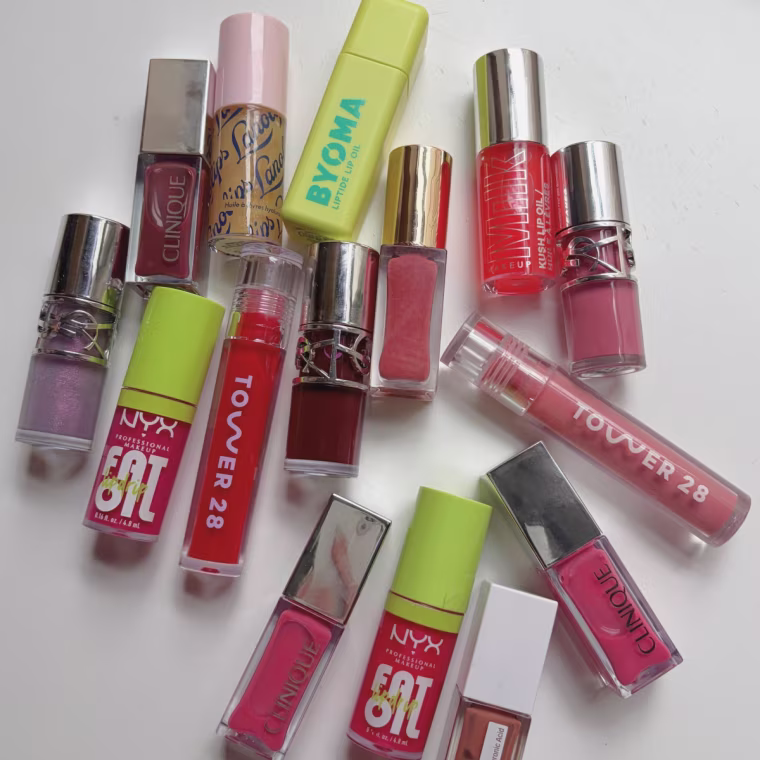 Pile of lip oils on a table