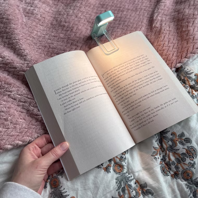 Glocusent Portable Clip-on LED Reading Light in use.
