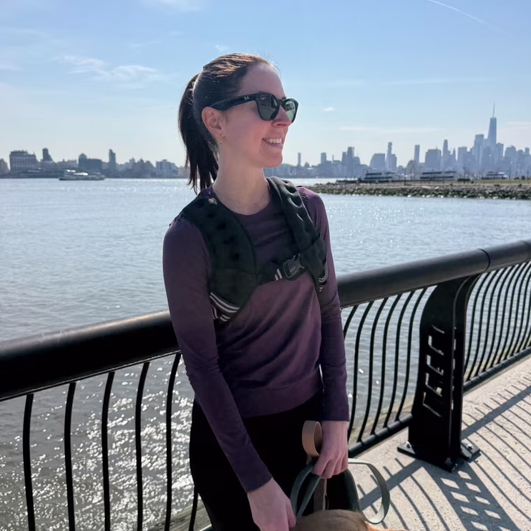 Shop TODAY senior editor Julie Ricevuto wears the weighted vest while out walking her dog.