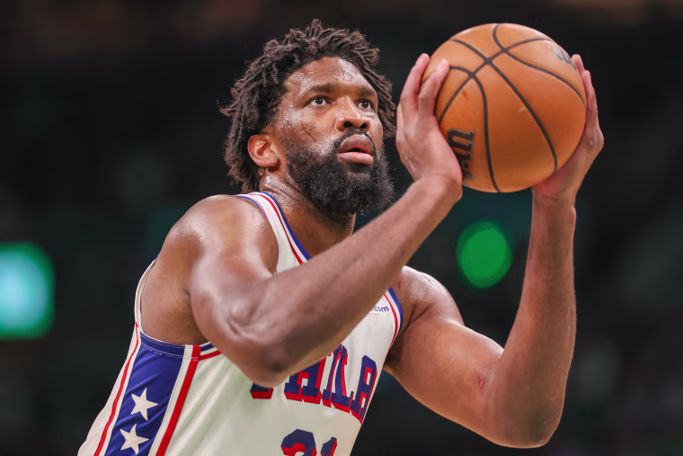 Joel Embiid of the Philadelphia 76ers attempts a free throw 
