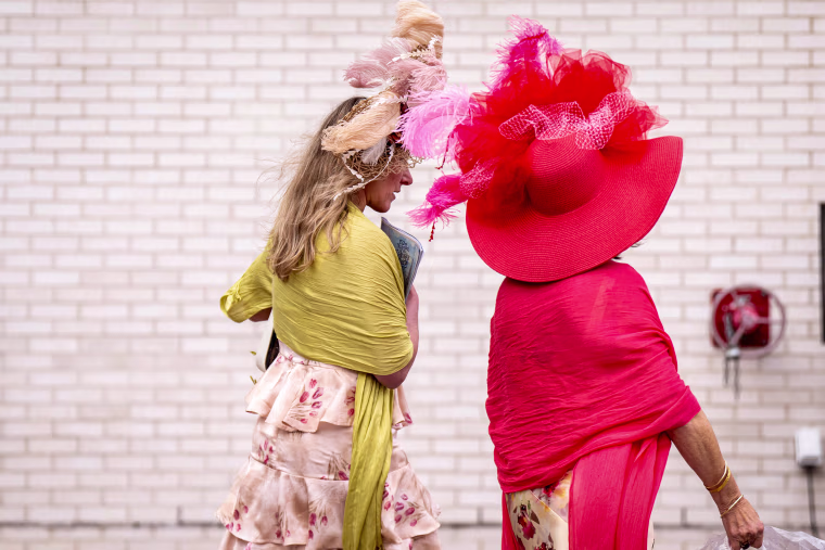 People wear Derby hats.