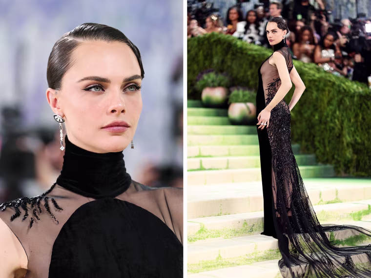 Cara Delevingne wears a black dress
