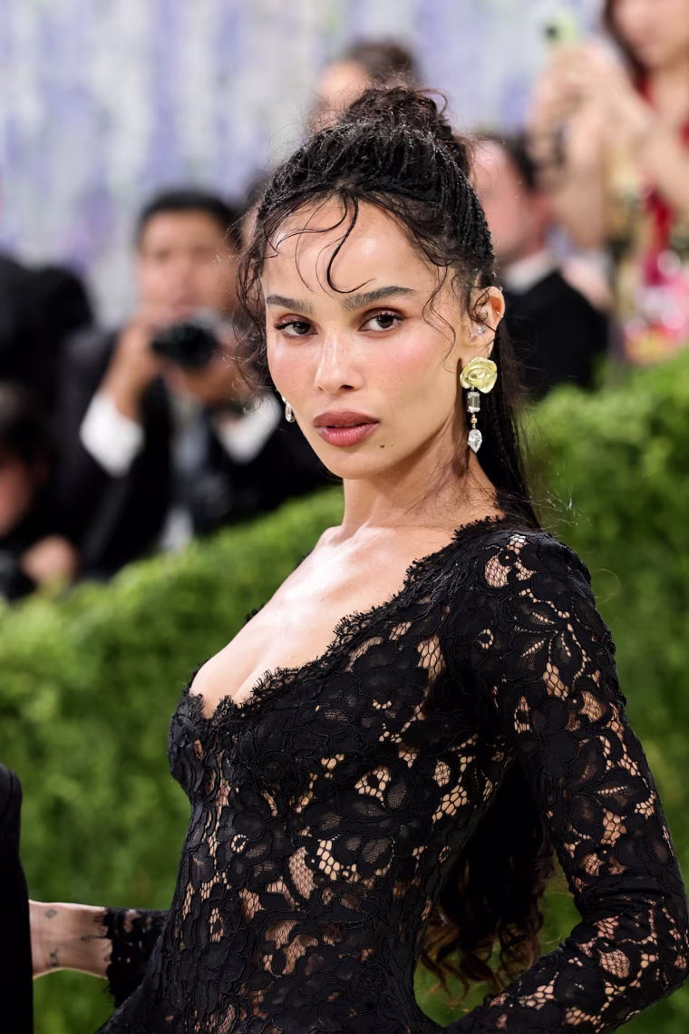 Zoe Kravitz in a lacy black gown.