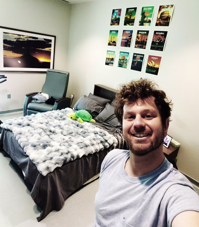 Jake Rosmarin shows off his quarantine room.