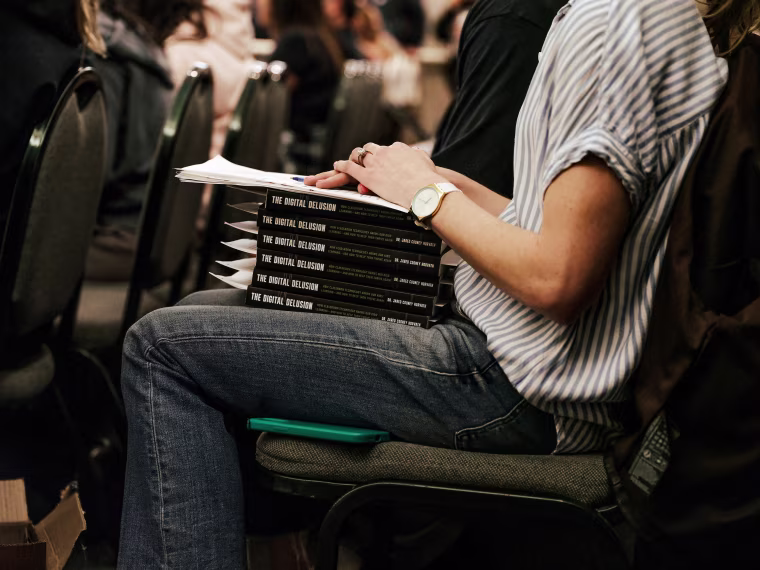 Parents brought copies of "The Digital Delusion" to give to school board members in Thousand Oaks, Calif., on Feb. 4.