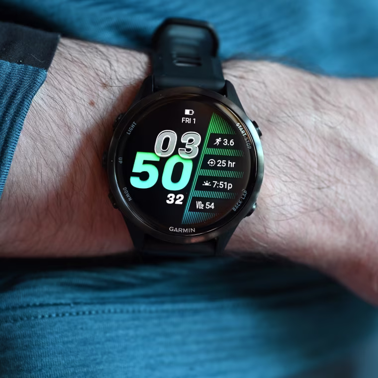 A close up of the Garmin Forerunner 970 on the wrist of the writer.