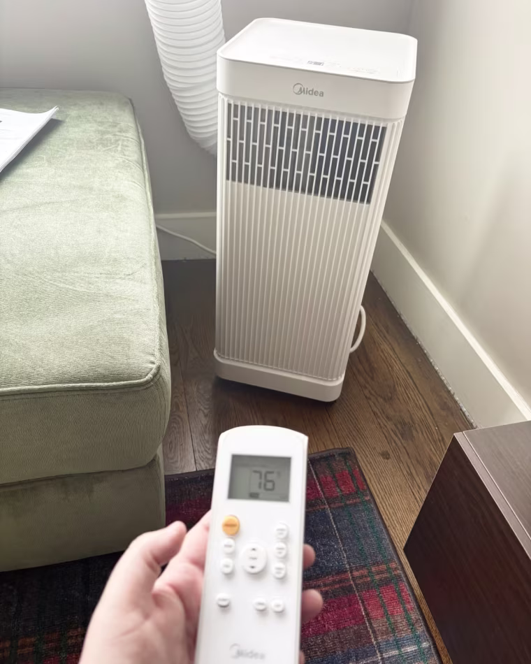 The Midea portable AC and its easy to use remote.