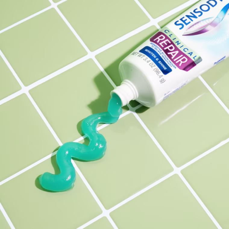 Photo of Sensodyne Clinical Repair Whiten & Shine toothpaste coming out of the tube