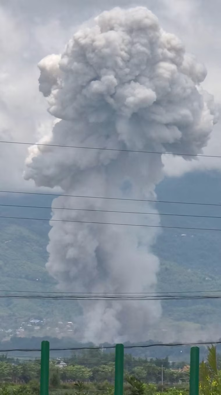 Smoke rises from an explosion in Myanmar as seen from Ruili, Yunnan Province, China