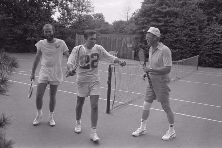 President Gerald Ford, Chief of Staff Donald Rumsfeld, and David Kennerly, Personal Photographer to the President, following a Tennis Match on the White House Tennis Courts in 1975.