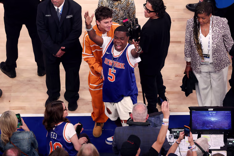 Tracy Morgan riles the crowd courtside.