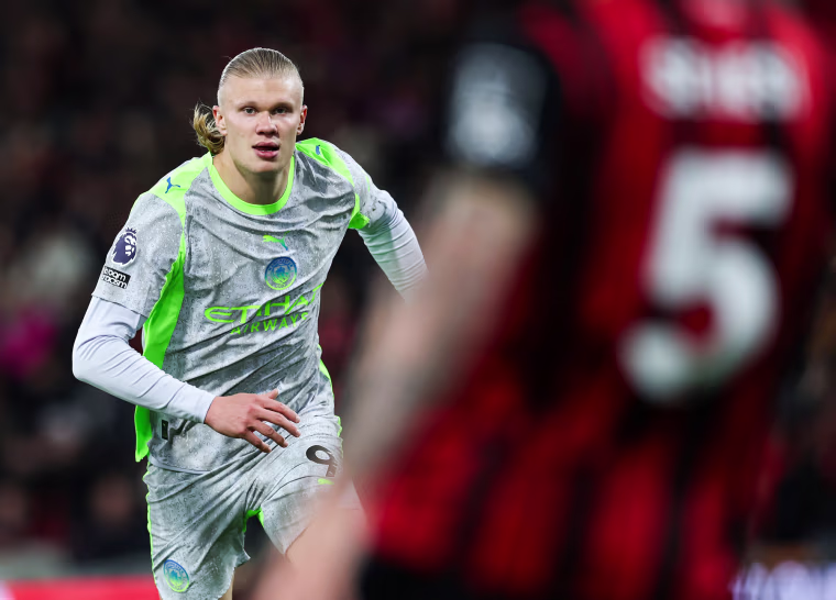 Erling Haaland runs on the soccer field