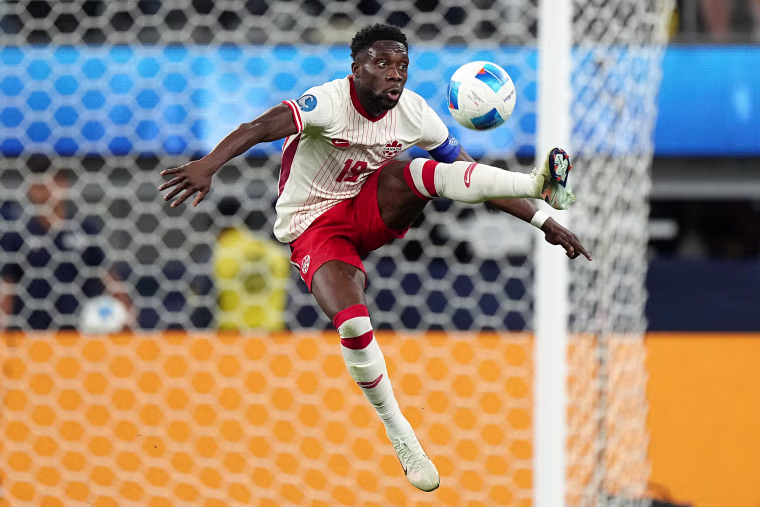 Alphonso Davies of Canada controls the ball during a match against Mexico on March 20, 2025 in Inglewood, Calif.
