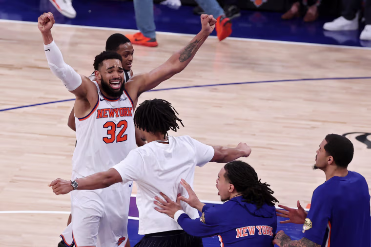 New York Knicks star Karl-Anthony Towns celebrates after his team's 107-106 victory against the San Antonio Spurs in Game 4 of the NBA Finals at Madison Square Garden.