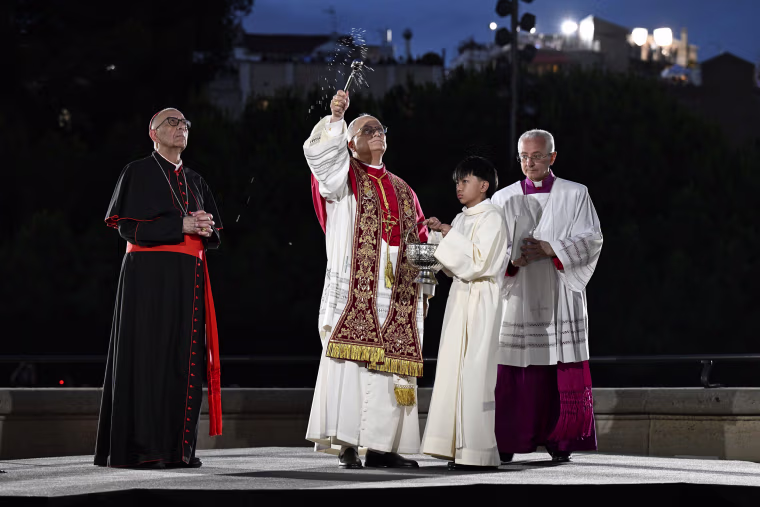 Pope Leo XIV, flanked by Archbishop of Barcelona cardinal Juan Jose Omella, presides over the inauguration of the tower of Jesus Christ at the Basilica of the Sagrada Família 