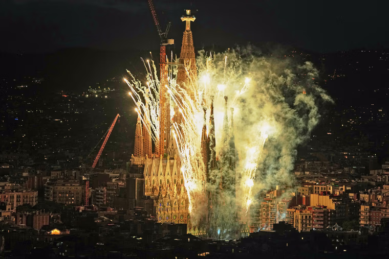 Fireworks engulf Antoni Gaudí's Basilica of the Sagrada Família after Pope Leo XIV blessed the newly completed central Tower of Jesus Christ in Barcelona, Spain, Wednesday, June 10, 2026. 