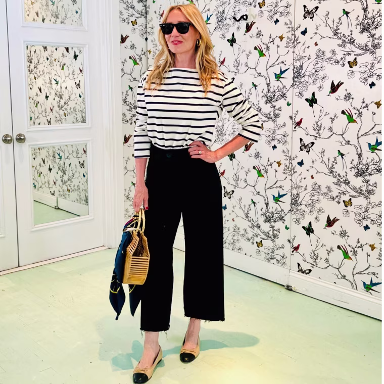 This casual top looks chic when styled with flats, black pants and a summery bag.