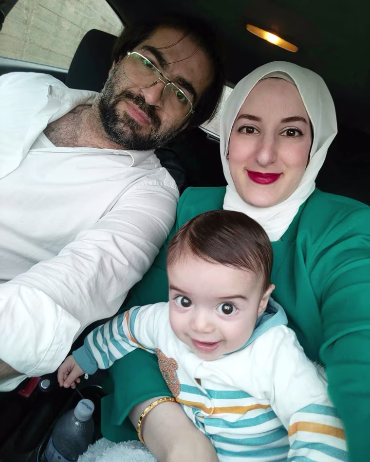 Baby Sam with his father, Fahd Abu Haikal, and mother, Dania Salameh.
