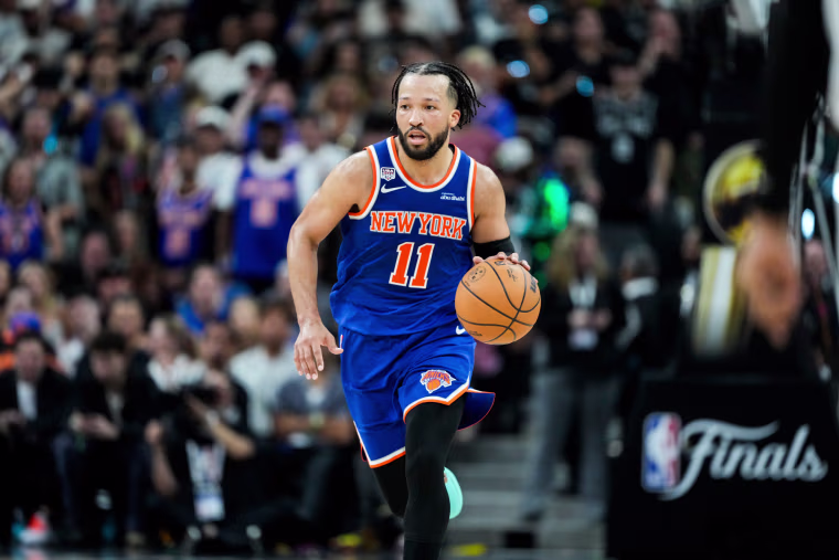 Jalen Brunson runs on the basketball court
