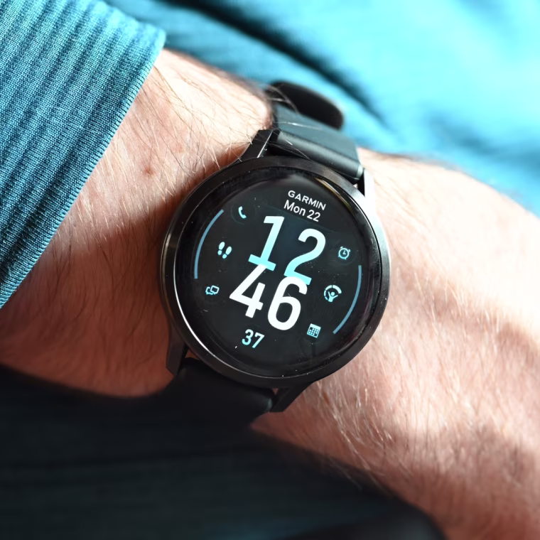 A close-up of the Garmin Venu 4 on the wrist of the writer.