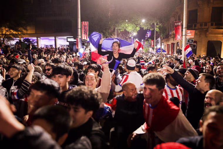 Paraguayan fans celebrate World Cup win over Germany