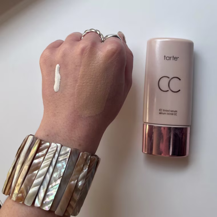 Associate market editor Audrey Ekman has an unblended line straight from the bottle on the left side of her hand and a patch that's been blended in and transformed to match her skin tone on the right.